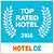 „Top Rated Hotel“-Abzeichen. Das Logo ist mit einem blauen Hintergrund und einem Lorbeerkranz verziert, der traditionell für hohe Auszeichnungen und Anerkennung steht. Unter dem Kranz ist der Schriftzug "TOP RATED HOTEL" zu sehen, was darauf hinweist, dass das Hotel eine besonders hohe Bewertung erhalten hat. Das Abzeichen stammt von Hotel.de, einer Plattform für Hotelbuchungen.
